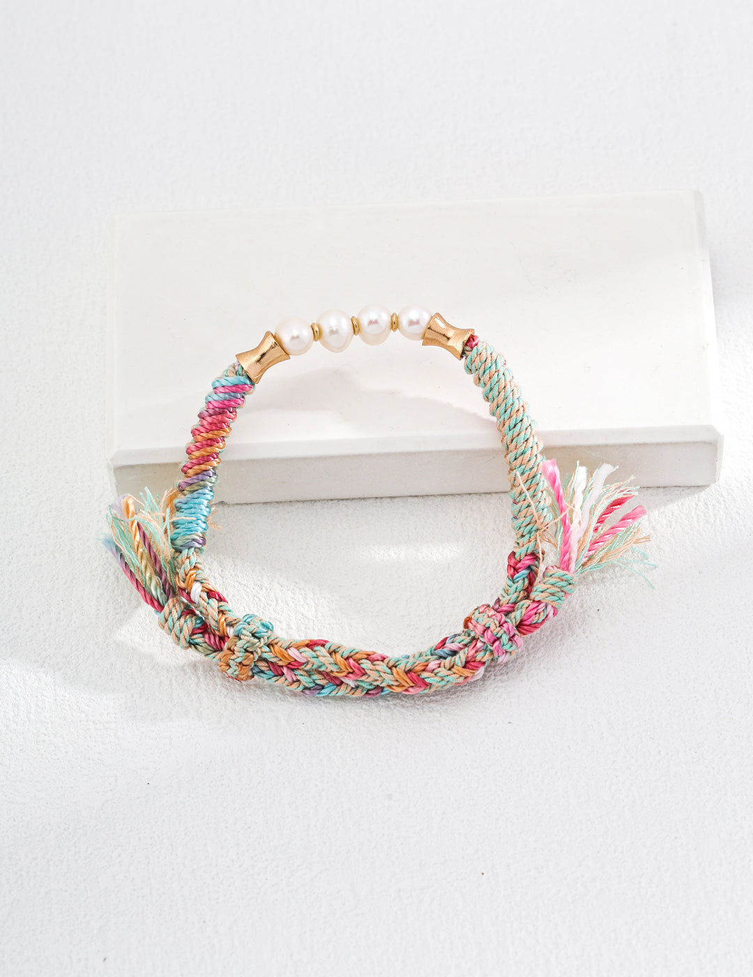 Multi Colours Woven Bracelet With Natural Pearls And Gold Plated Silver